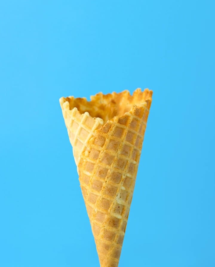 Ice cream cone on a light blue background