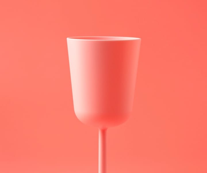 Cup on a palette red background